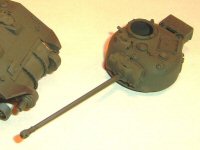 [- The directions are vague - you're supposed to glue the mantlet frame inside the turret, then glue the mantlet to it from outside the turret.]