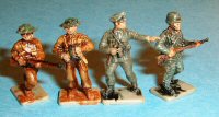 [All 4 Valiant Soldiers:  From left to right, British enlisted rank advancing with .303 Lee Enfield rifle, British Officer with Pistol in right-hand and binoculars in left; German Officer with binoculars, German infantryman with Mauser.]