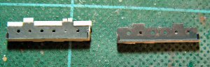 [20mm galleries before fixing (right) and after plastic strips were added to move the attachment holes away from the sides (left).]