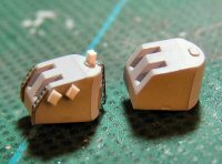 [5in turrets from the kit before and after modifications.]